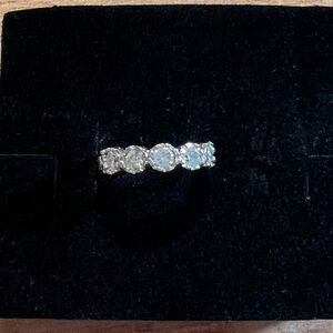 Elegant Silver tone single hoop earring.